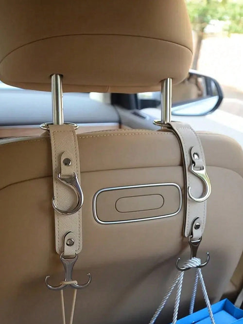 1Pc PU Leather & Metal Car Seat Back Hook- Practicality With Heavy-Duty Load-Bearing Materials, Saves Space With A Hidden Design. It Can Hang Bags, Clothes, Umbrellas, And More, And Is Compatible With