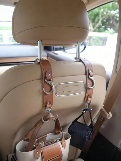 1Pc PU Leather & Metal Car Seat Back Hook- Practicality With Heavy-Duty Load-Bearing Materials, Saves Space With A Hidden Design. It Can Hang Bags, Clothes, Umbrellas, And More, And Is Compatible With