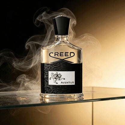 Creed Aventus EDP 100ml Top Notes: Bergamot, Apple Middle Notes: Pineapple, Patchouli Base Notes: Birch, Musk Men's Perfume In A Transparent Textured Black Bottle