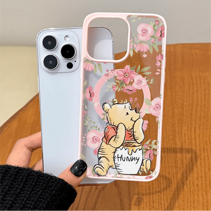 Disney.‌ Disney Winnie The Pooh Floral Patterned Phone Case Featuring A Cute Bear Enjoying Honey. Compatible With IPhone 17, 16, 15, 14, 13, 12, And 11 Pro Models. Made Of TPU With Shockproof Protecti
