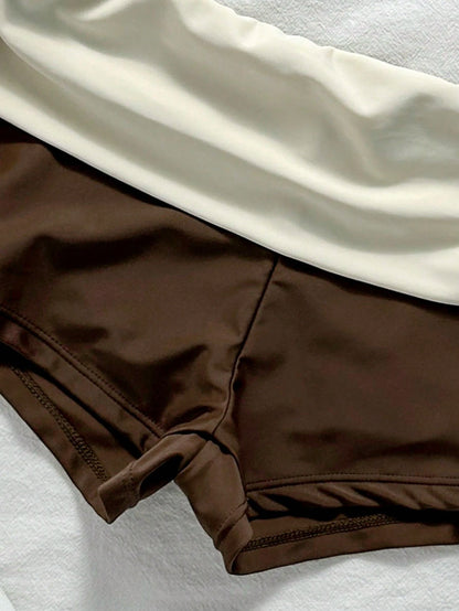 Elavelle Color-Blocked Bikini Set Consisting Of A Neck-Girdle Triangle Cup And High-Waist Wrap Shorts. Slimming And Covering Body Fat. Summer Vacation Swimsuit For Beach Trips, Seaside Vacations, And