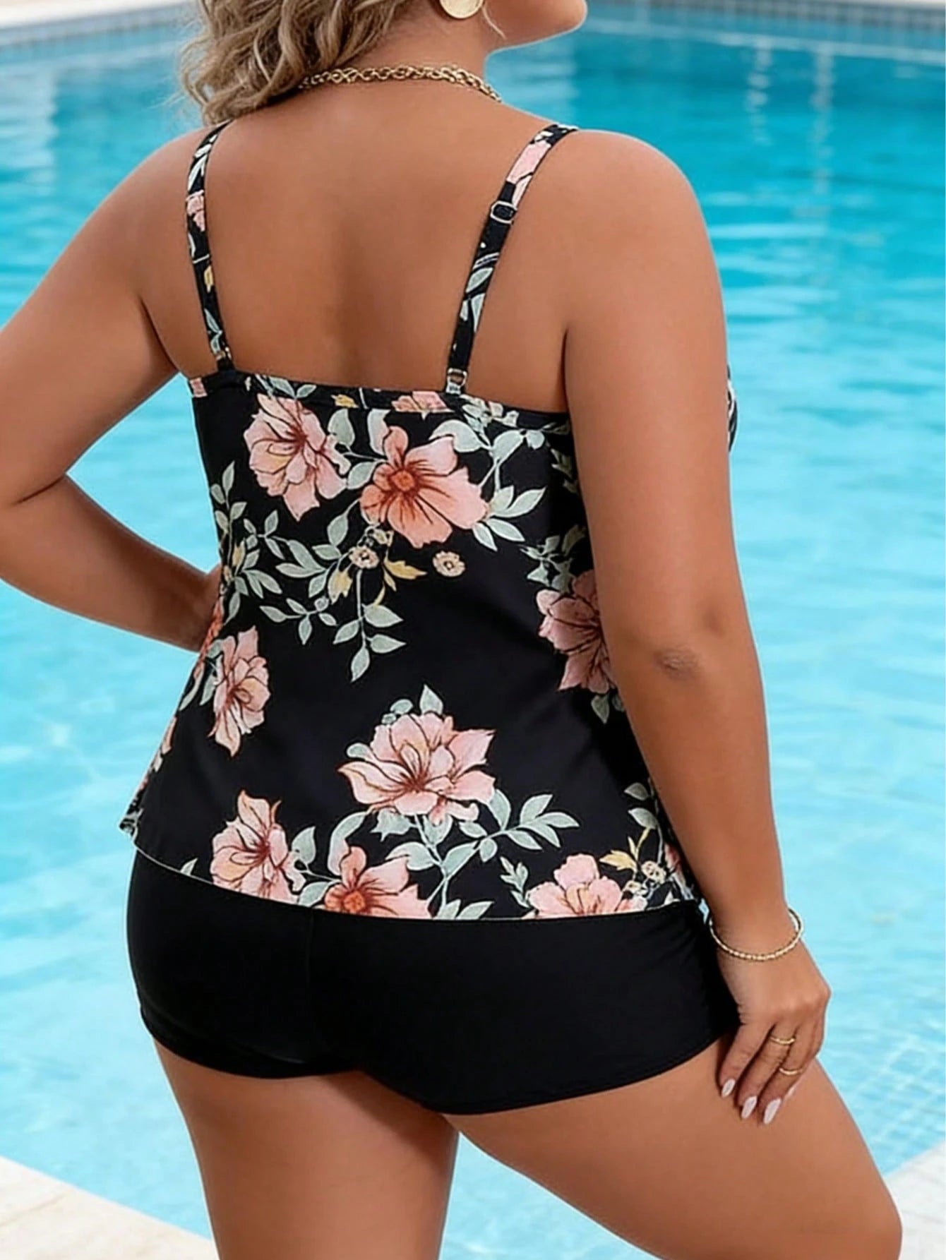 Plus-Size Black Floral Print Layered Ruffled Women's Tankini Swimsuit With Thin Straps And Conservative Boxer Shorts.